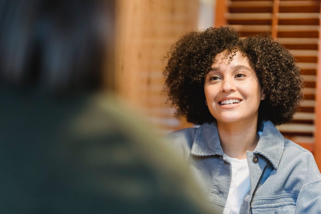 A Woman sharing her UCS AI Customer Support Chatbot review